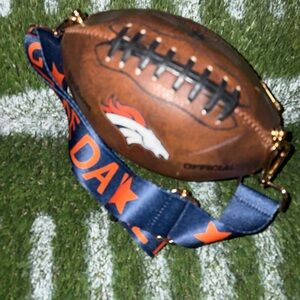 Football-Themed Broncos football bag with teams colors Blue/ orange Strap.9 in .